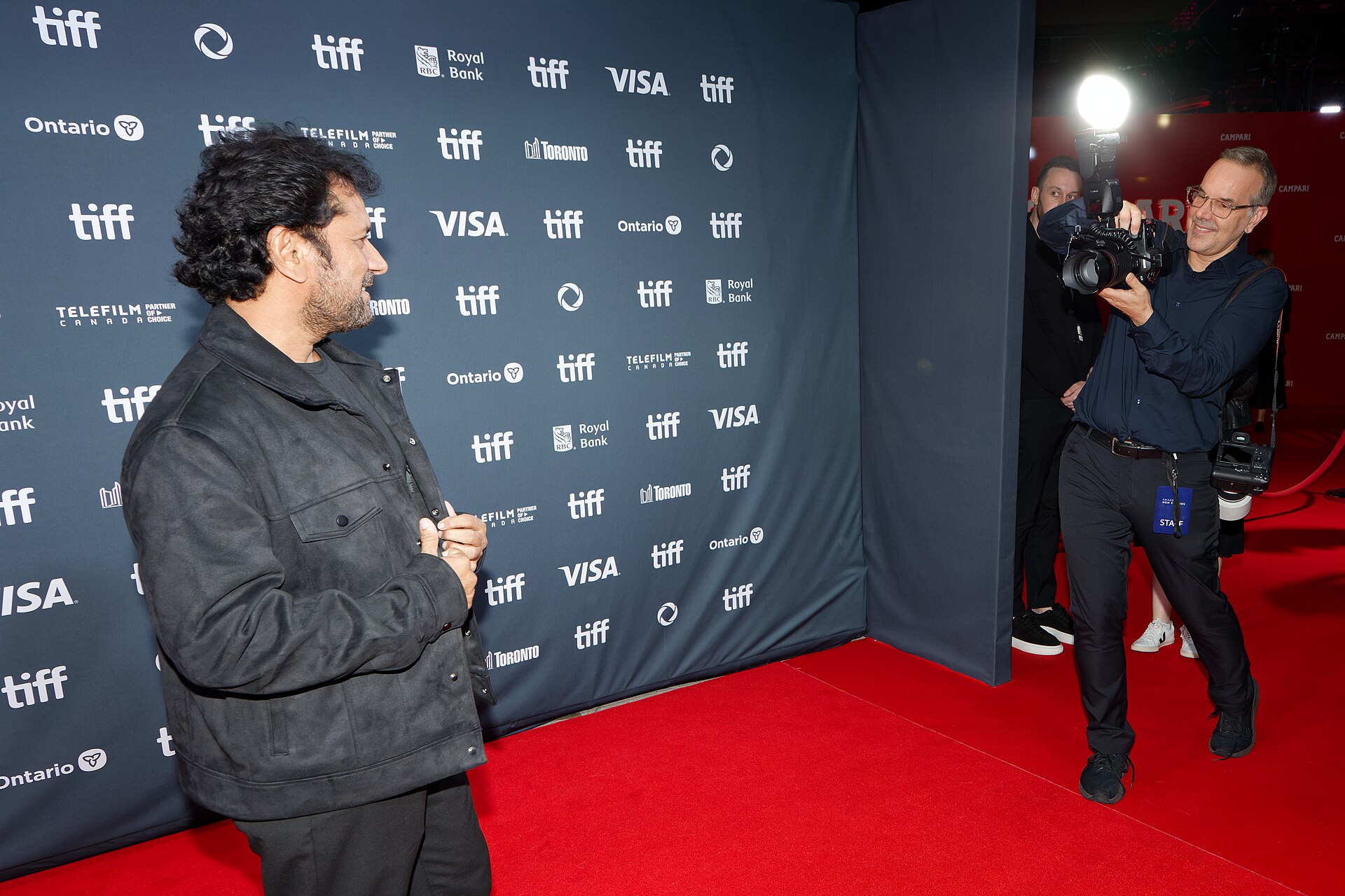 Nasir Shaikh being photographed at the 2024 Toronto International Film Festival (TIFF) for the movie Superboys Of Malegaon.