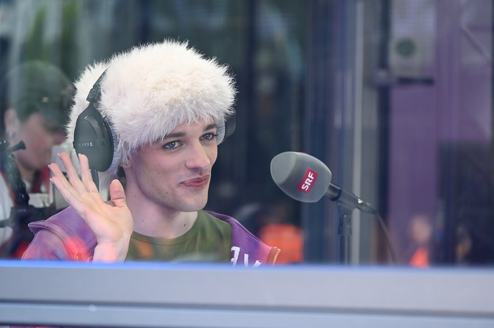 Nemo performing in the 2025 Eurovision Village in Basel, Switzerland