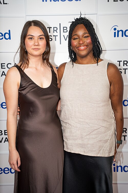 Olivia Owyeung and Toyosi Fuwa at a 2025 Tribeca Film Festival red carpet in New York City for the film Red Egg and Ginger Face.