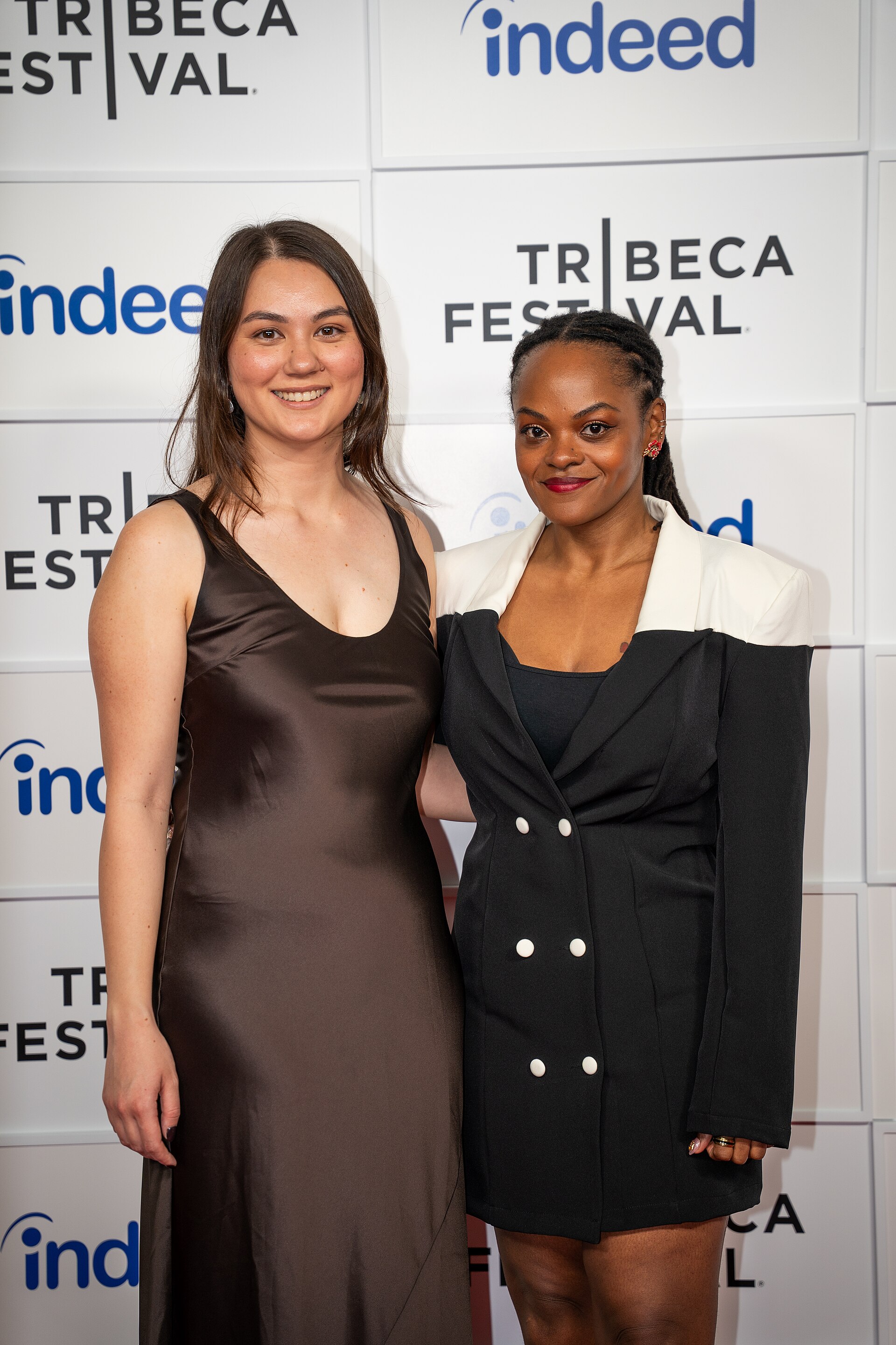Olivia Owyeung and Tracey Murray at a 2025 Tribeca Film Festival red carpet in New York City for the film Red Egg and Ginger Face.
