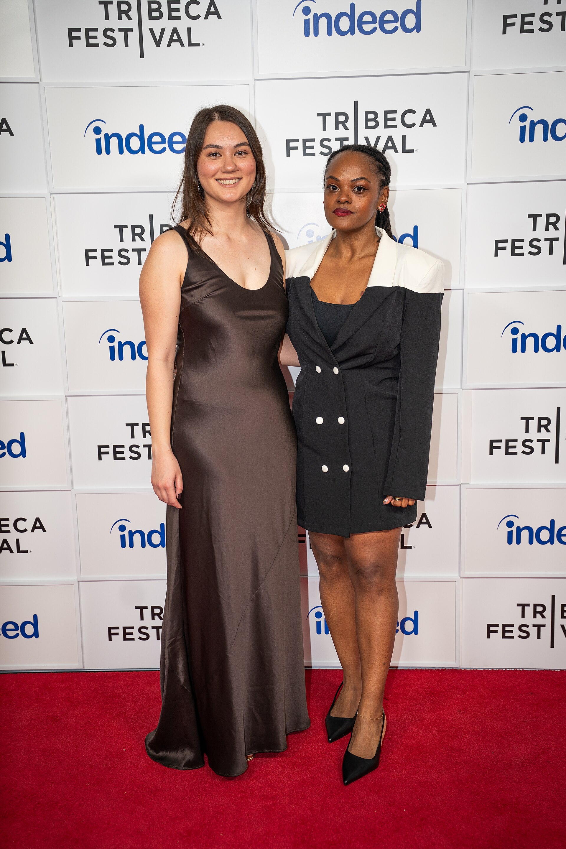 Olivia Owyeung and Tracey Murray at a 2025 Tribeca Film Festival red carpet in New York City for the film Red Egg and Ginger Face.