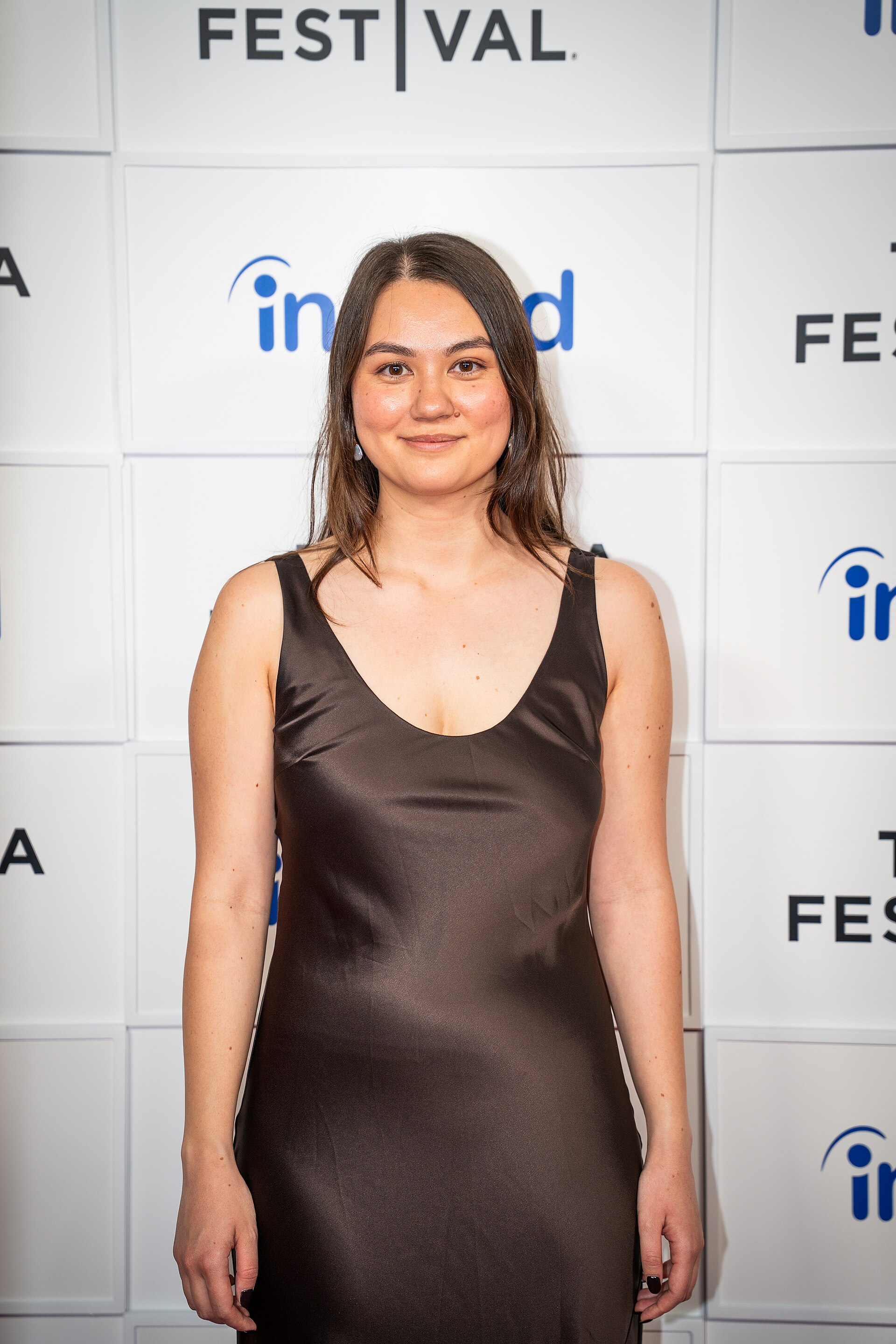 Olivia Owyeung, director and writer, at a 2025 Tribeca Film Festival red carpet in New York City for the film Red Egg and Ginger Face.