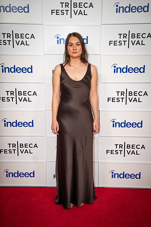 Olivia Owyeung, director and writer, at a 2025 Tribeca Film Festival red carpet in New York City for the film Red Egg and Ginger Face.