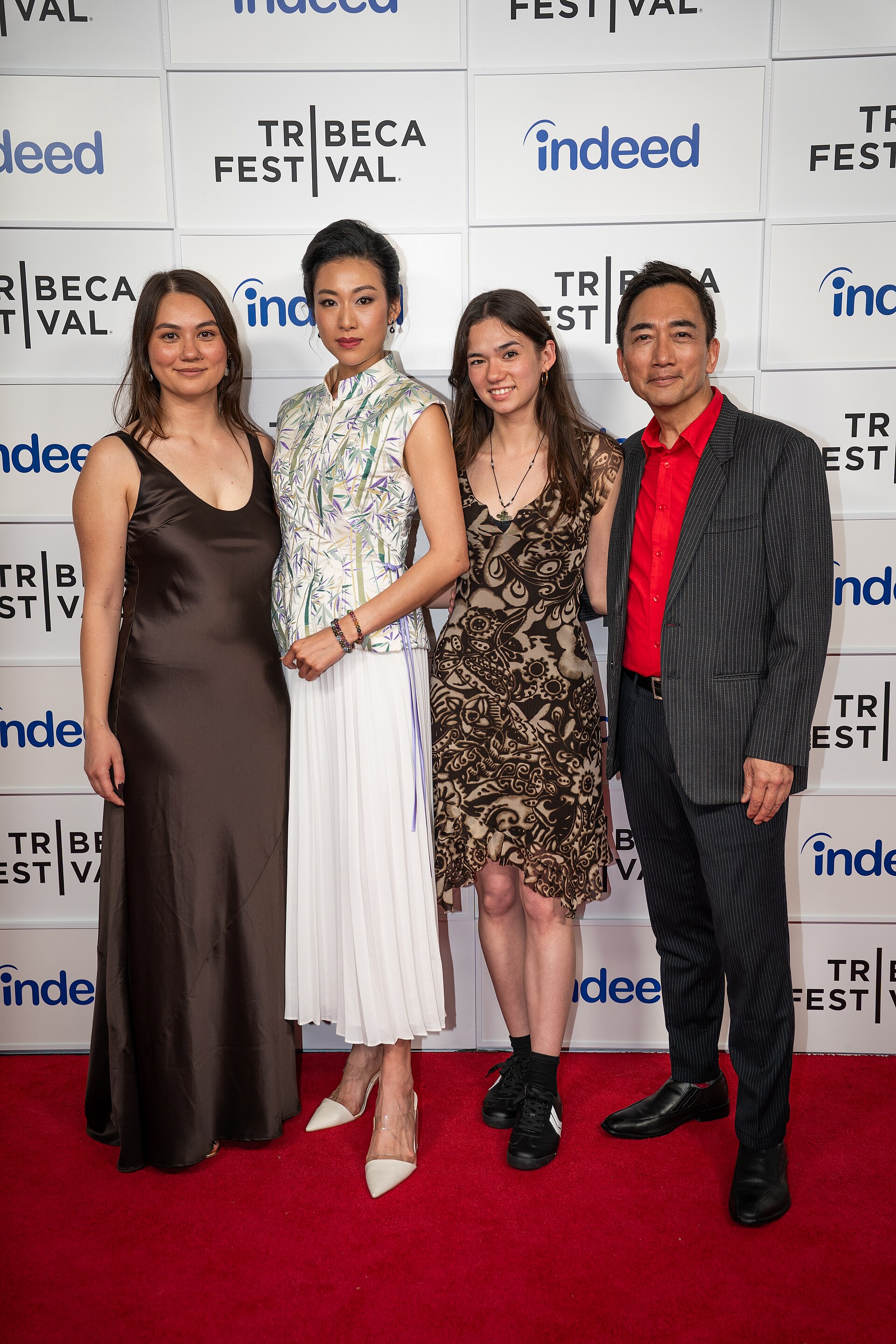 Olivia Owyeung, Quanna Luo Masterson, Leah Dawson, and David K. S. Tse at a 2025 Tribeca Film Festival red carpet in New York City for the film Red Egg and Ginger Face.