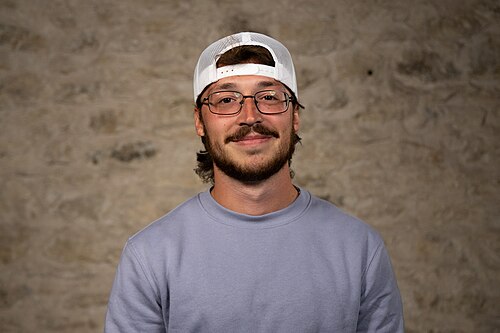 Parker Shoemaker, Sales Development Representative, Vivax Pros, at the WikiPortraits studio at the 2025 SXSW Festival.