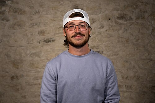 Parker Shoemaker, Sales Development Representative, Vivax Pros, at the WikiPortraits studio at the 2025 SXSW Festival.