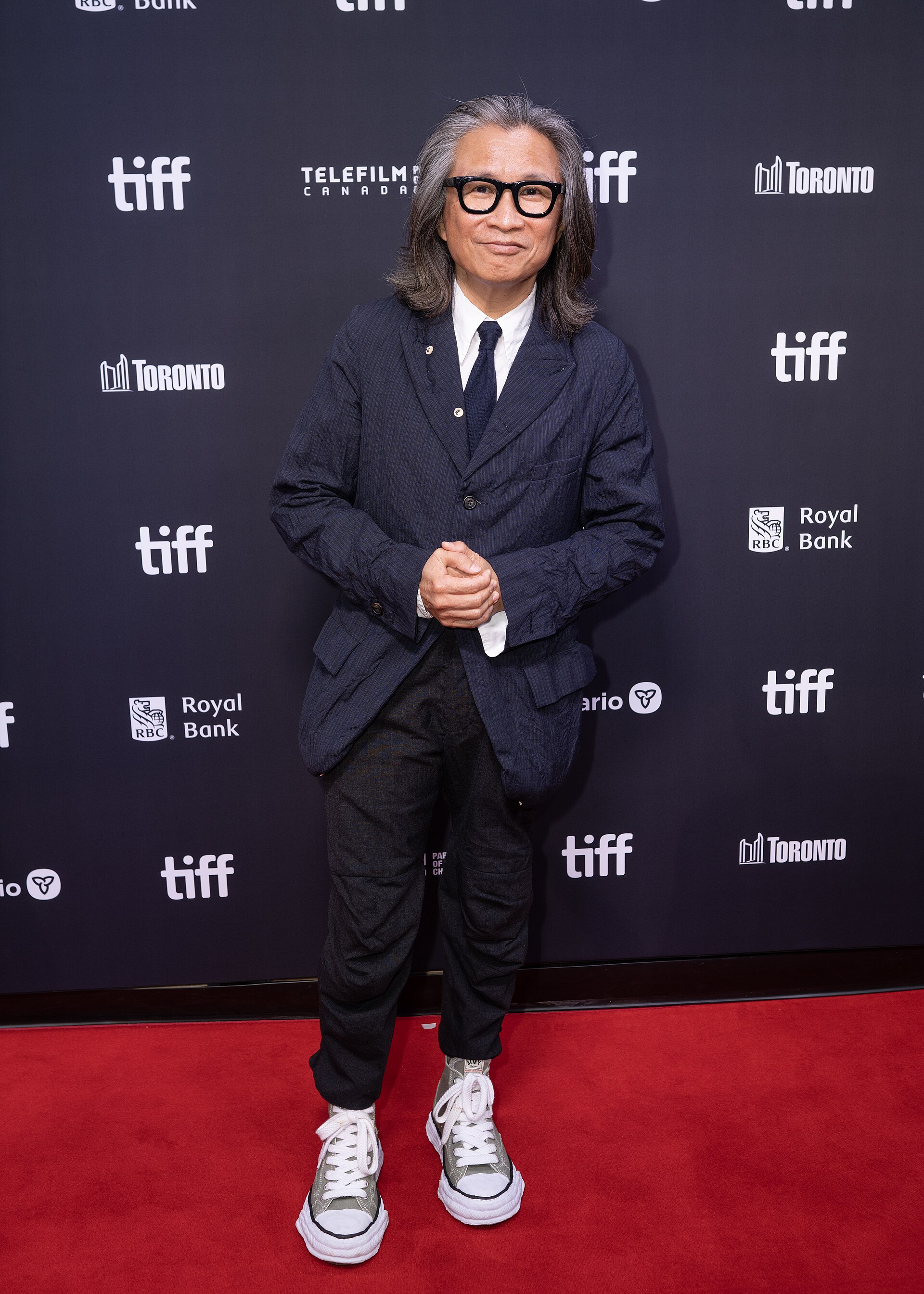 Peter Ho-sun Chan on the red carpet during TIFF 2025