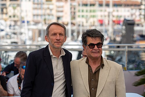 Philippe Martin and Jafar Panahi at 2025 Cannes Photocall