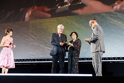 Producers Georges Schoucair and Myriam Sassine receive the Raimondo Rezzonico Award at  the 78th Locarno Film Festival on August 07, 2025 in Locarno, Switzerland.