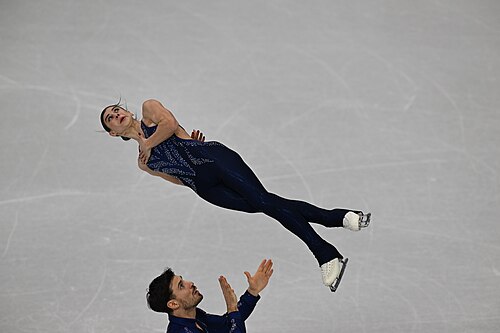 MILAN, ITALY - 15 FEBRUARY 2026: Rebecca Ghilardi and Filippo Ambrosini of Italy compete during the Figure Skating Pair Skating Short Program at the Olympic Winter Games Milano Cortina 2026 Milano Ice Skating Arena on February 15, 2026 in Milan, Italy