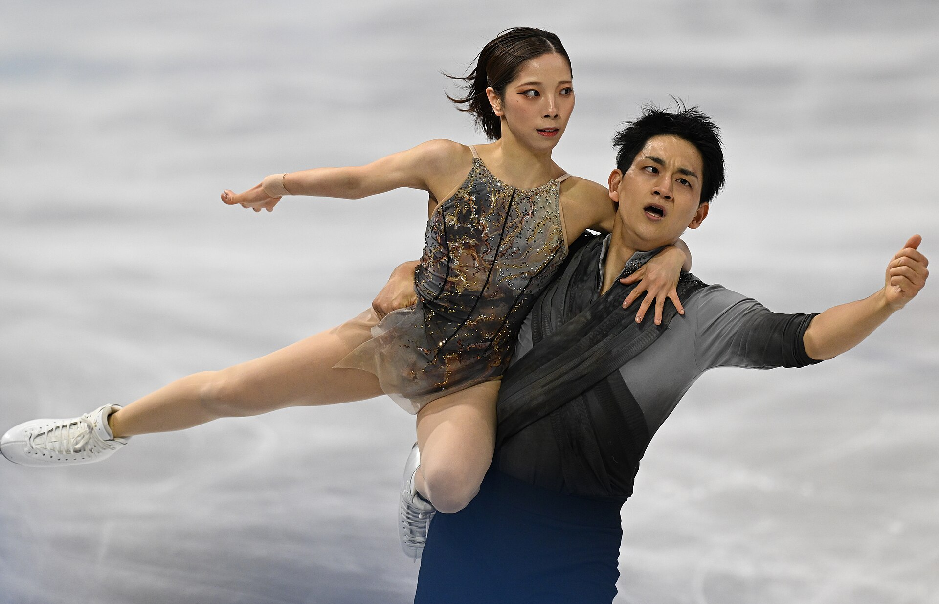 MILAN, ITALY - 16 FEBRUARY 2026: Riku MIURA and Ryuichi KIHARA of Japan compete during the Figure Skating Pair Skating Free Skating at the Olympic Winter Games Milano Cortina 2026 Milano Ice Skating Arena on February 16, 2026 in Milan, Italy