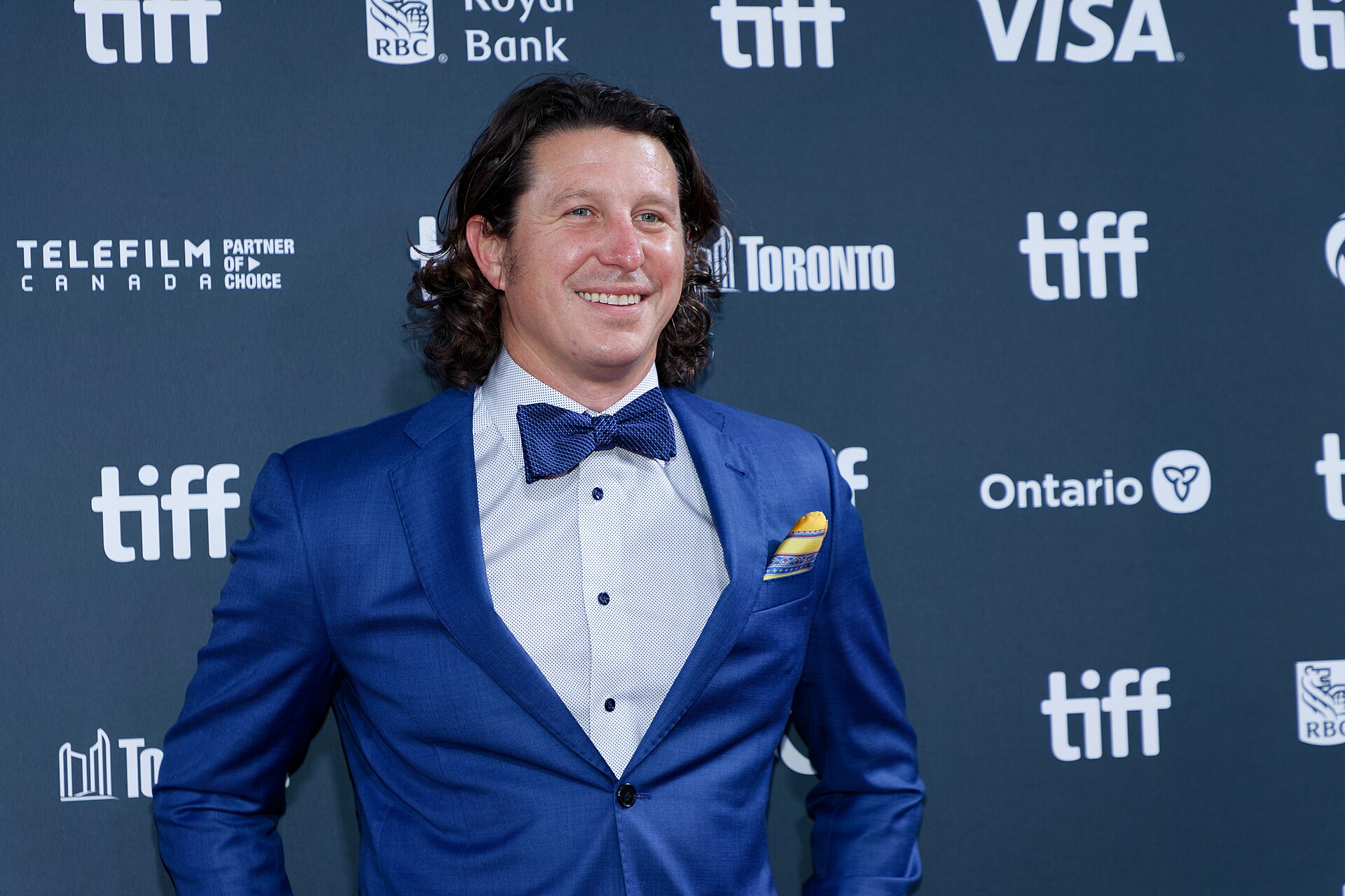Russell Wayne Groves at the 2024 Toronto International Film Festival (TIFF) for the movie Takin' Care of Business.