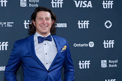 Russell Wayne Groves at the 2024 Toronto International Film Festival (TIFF) for the movie Takin' Care of Business.