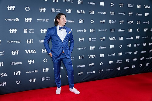 Russell Wayne Groves at the 2024 Toronto International Film Festival (TIFF) for the movie Takin' Care of Business.