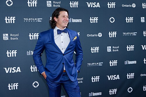 Russell Wayne Groves at the 2024 Toronto International Film Festival (TIFF) for the movie Takin' Care of Business.