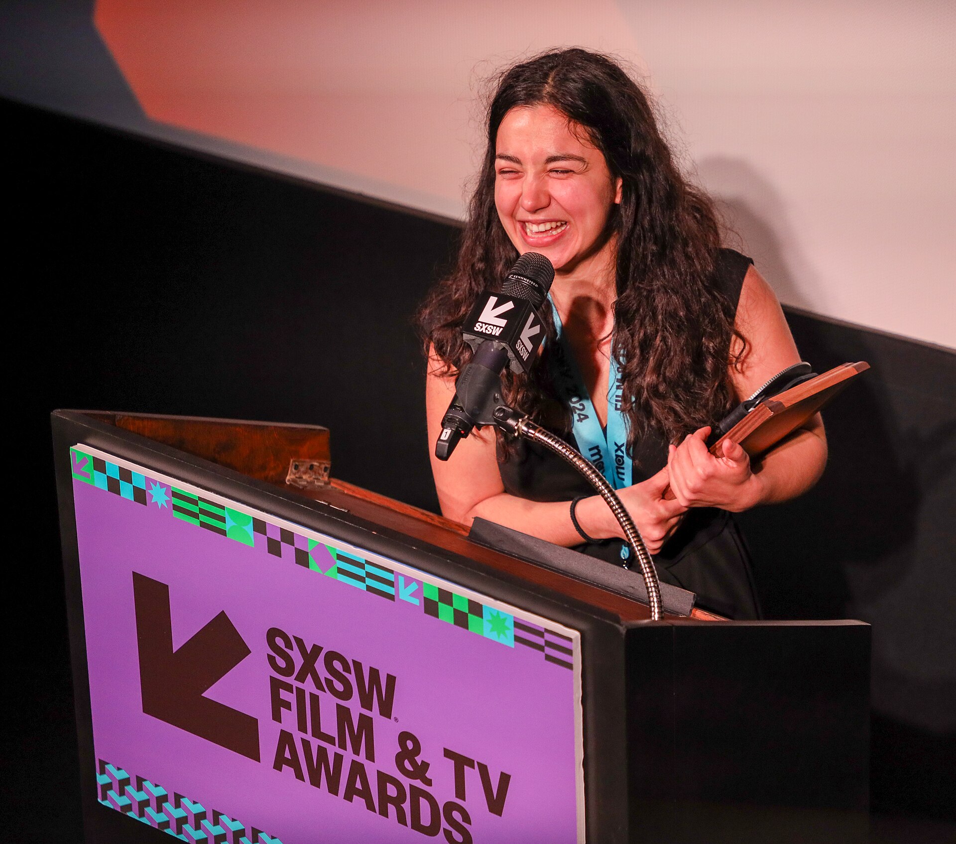 Cécile Cournelleon on stage at the SXSW 2024 Film Festival award ceremony that took place at the Paramount Theatre in Austin, Texas. Cournelleon's music video for "Mom told you so" by Célen won the SXSW 2024 Music Video Competition Award.