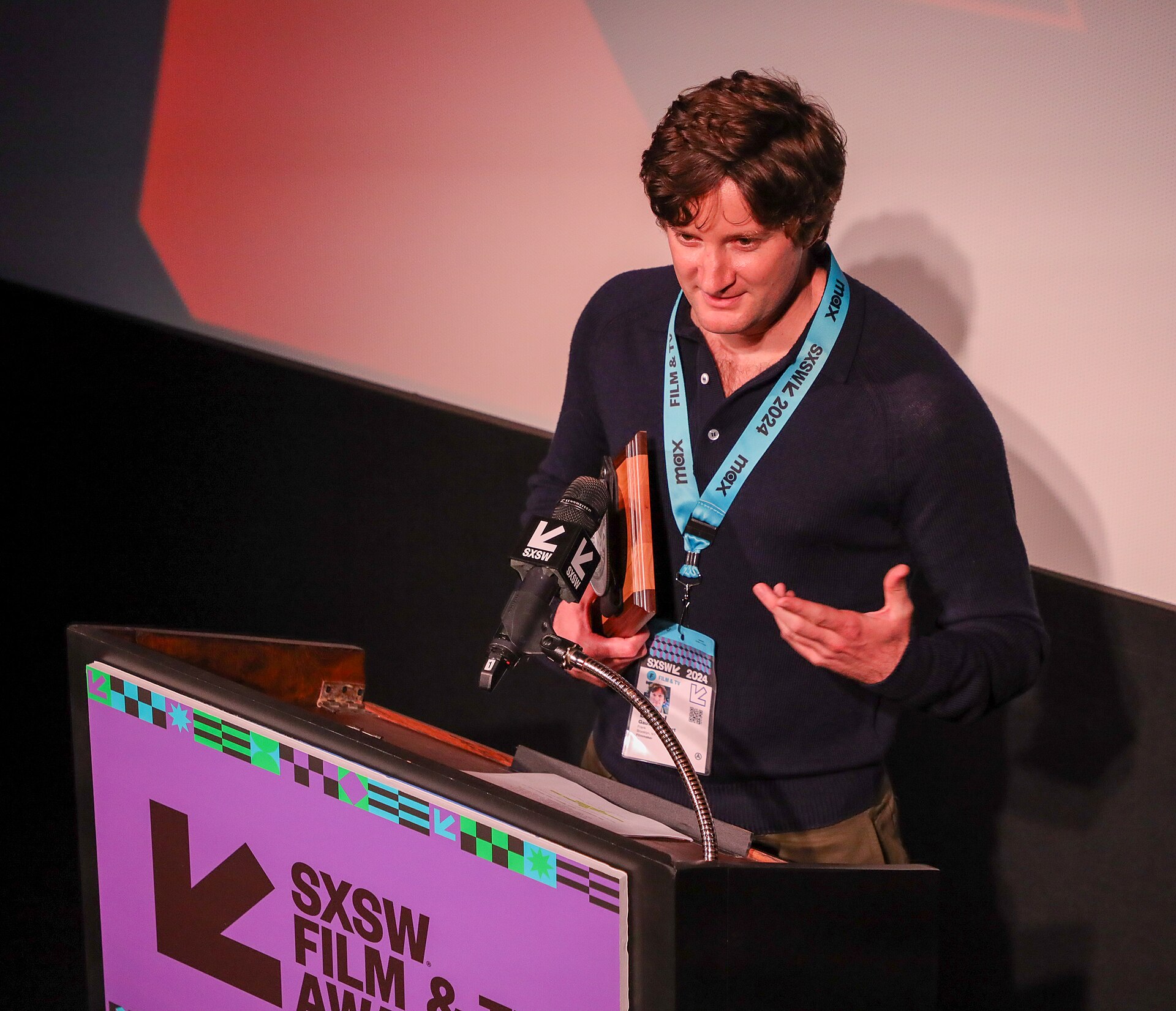 David Gauvey Herbert on stage at the SXSW 2024 Film Festival award ceremony that took place at the Paramount Theatre in Austin, Texas. David Gauvey Herbert won the SXSW 2024 Documentary Short Competition Special Jury Award for the film Frank.