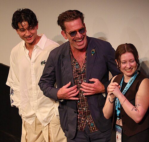 Three members of the cast and crew of Marvin Is Sorry on stage at the SXSW 2024 Film Festival award ceremony that took place at the Paramount Theatre in Austin, Texas. The pilot won the SXSW 2024 Independent TV Pilot Competition Award.