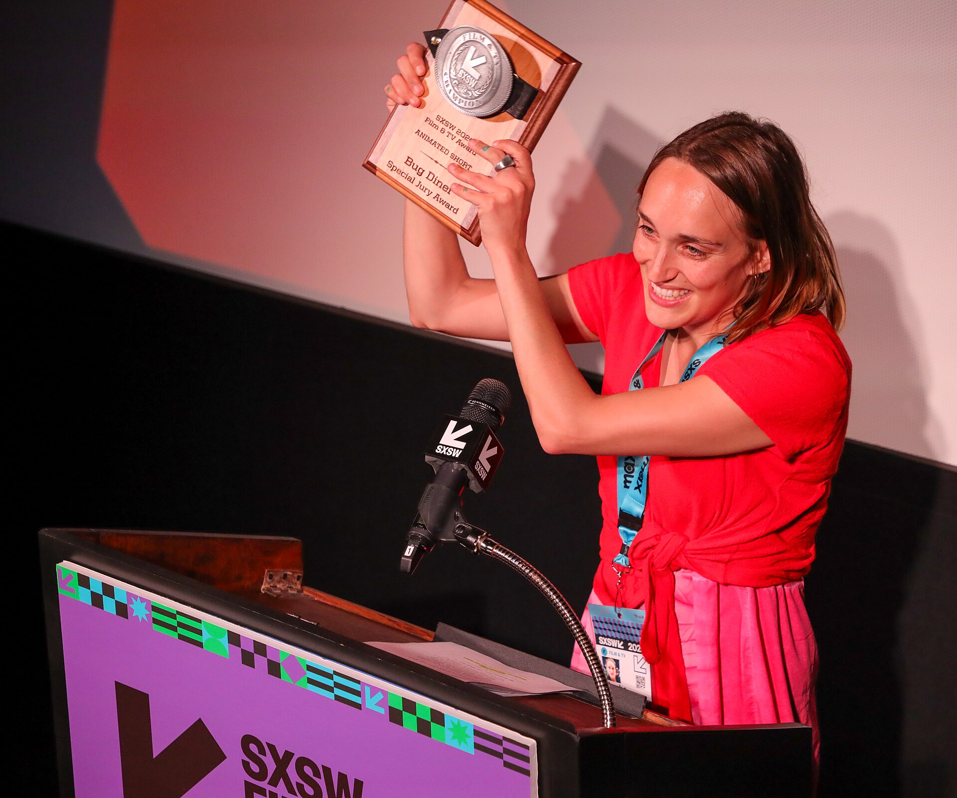 Phoebe Jane Hart on stage at the SXSW 2024 Film Festival award ceremony that took place at the Paramount Theatre in Austin, Texas. Phoebe Jane Hart won the SXSW 2024 Animated Shorts Competition Special Jury Award for her film Bug Diner.