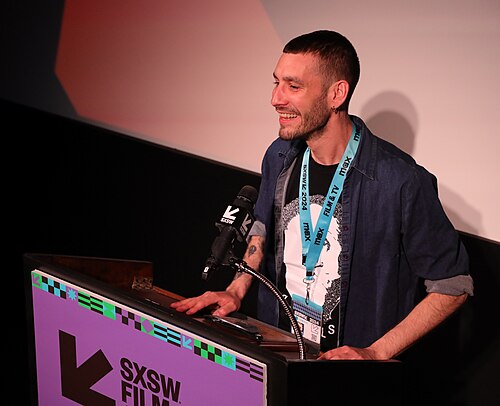 Rodrigue Huart on stage at the SXSW 2024 Film Festival award ceremony that took place at the Paramount Theatre in Austin, Texas. Rodrigue Huart's film, Transylvanie, won the SXSW 2024 Midnight Shorts Competition Award.