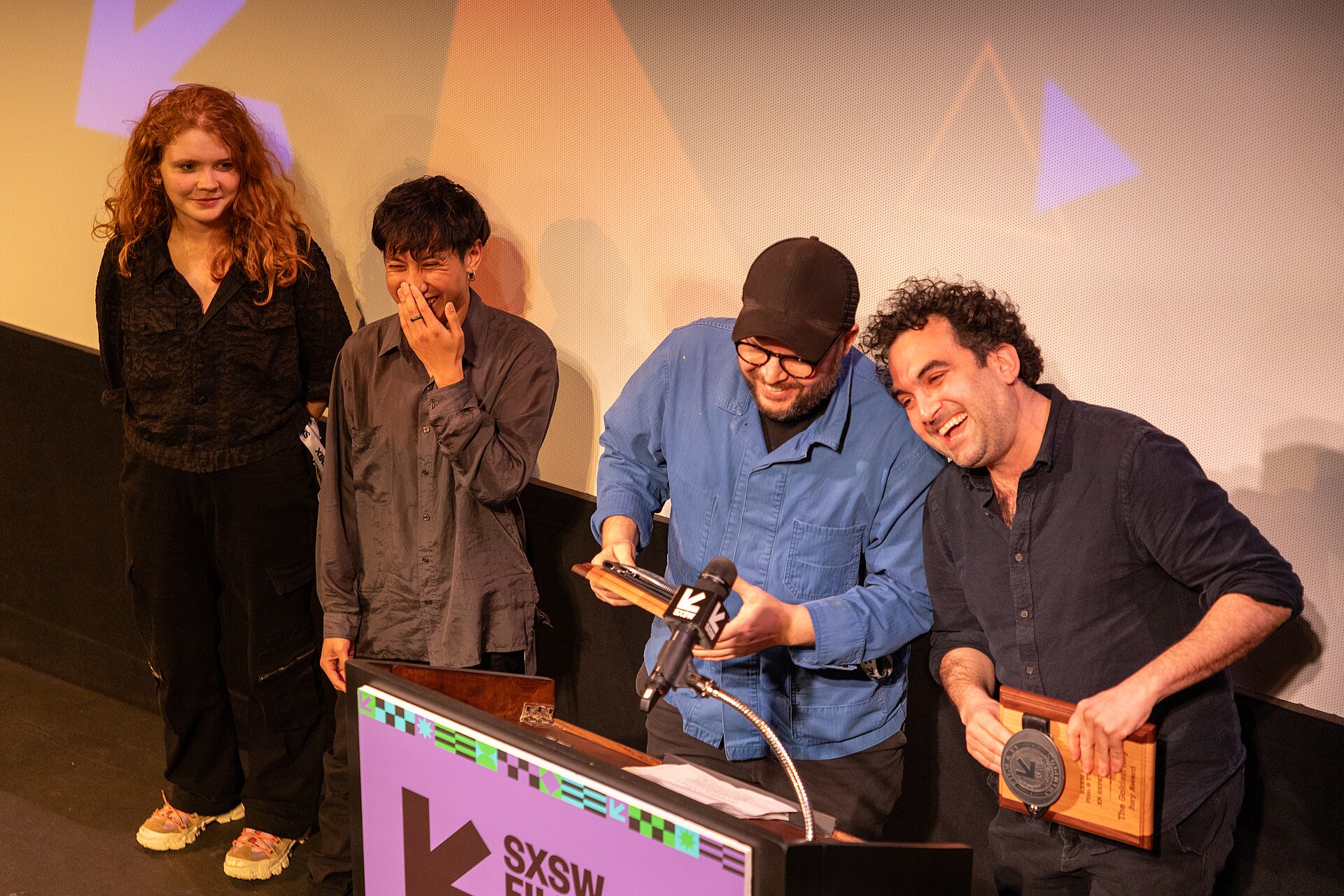 Cast and crew of The Golden Key on stage at the SXSW 2024 Film Festival award ceremony that took place at the Paramount Theatre in Austin, Texas. The film, directed by Marc Da Costa and Matthew Niederhauser, won the SXSW 2024 XR Experience Competition Award.