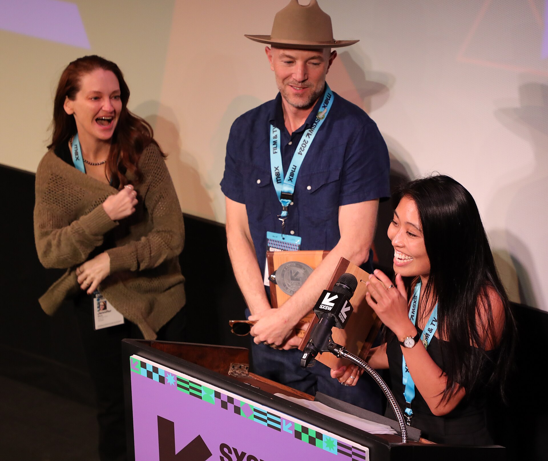 Carina Mia Wong, Alex Simmons, and Jennifer Wood of We Can Be Heroes on stage at the SXSW 2024 Film Festival award ceremony that took place at the Paramount Theatre in Austin, Texas. Carina Mia Wong and Alex Simmons won the SXSW 2024 Documentary Feature Competition Special Jury Award.
