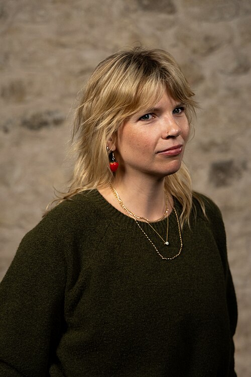Samantha Cole, Samantha Cole, co-founder 404 Media, at the WikiPortraits studio at the 2025 SXSW Festival.