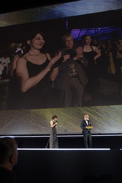 Sandy Altermann and Giona A. Nazzaro on stage at Piazza Grande before the screening of Le Pays d'Arto