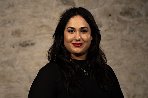 Sanjida Humayun, Manager of Automation and Technology, at the WikiPortraits studio at the 2025 SXSW Festival.