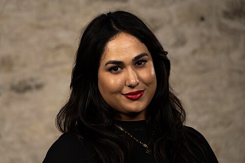 Sanjida Humayun, Manager of Automation and Technology, at the WikiPortraits studio at the 2025 SXSW Festival.