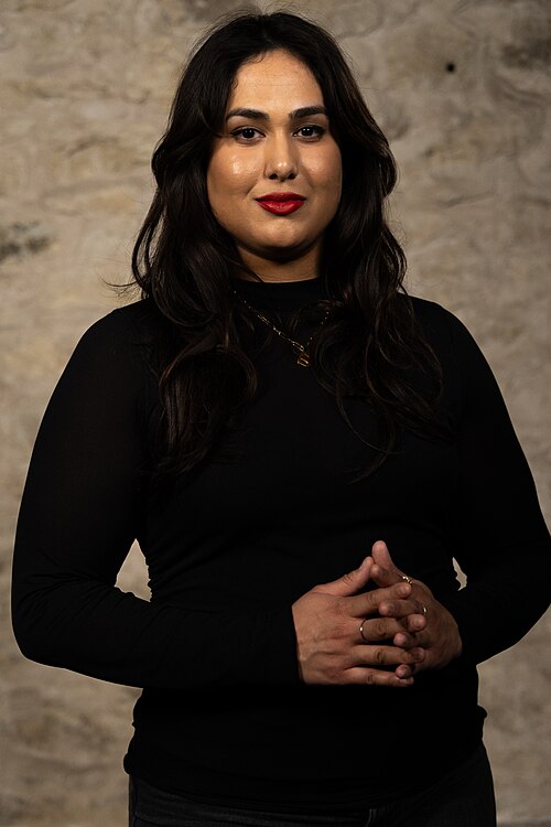 Sanjida Humayun, Manager of Automation and Technology, at the WikiPortraits studio at the 2025 SXSW Festival.