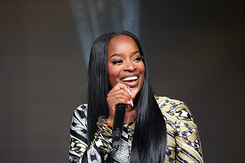 Shamea Morton at Essence Fest 2025 speaking at the GBEF