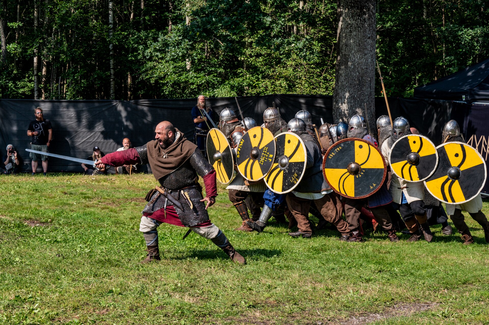 Swedish Grimfrost demonstrating shield wall techniques at Midgardsblot festival in Norway, 2024