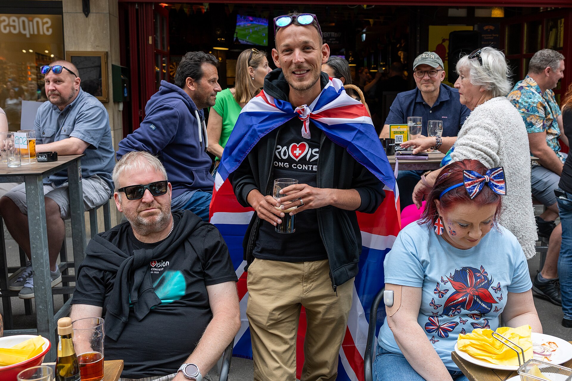 People enjoying the vibes on Eurovision Street in Basel, Switzerland. ESC 2025