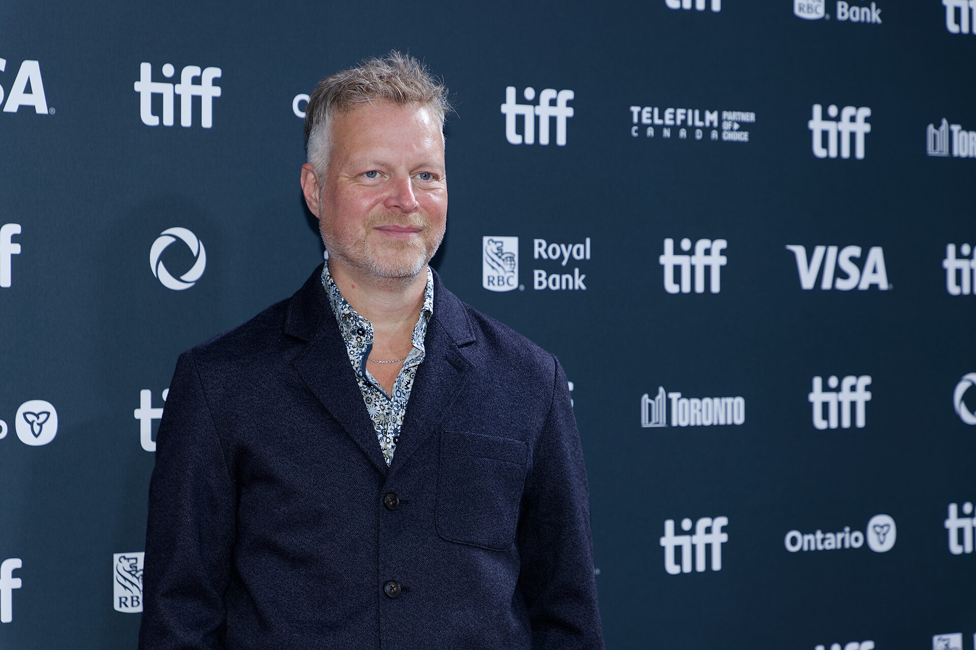 Tal Bachman at the 2024 Toronto International Film Festival (TIFF) for the movie Takin' Care of Business.