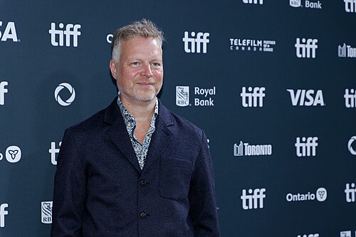 Tal Bachman at the 2024 Toronto International Film Festival (TIFF) for the movie Takin' Care of Business.