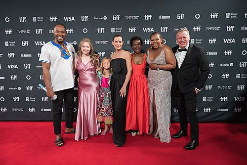 The cast and crew of 'Don't Let's Go to the Dogs Tonight' at the 2024 Toronto International Film Festival