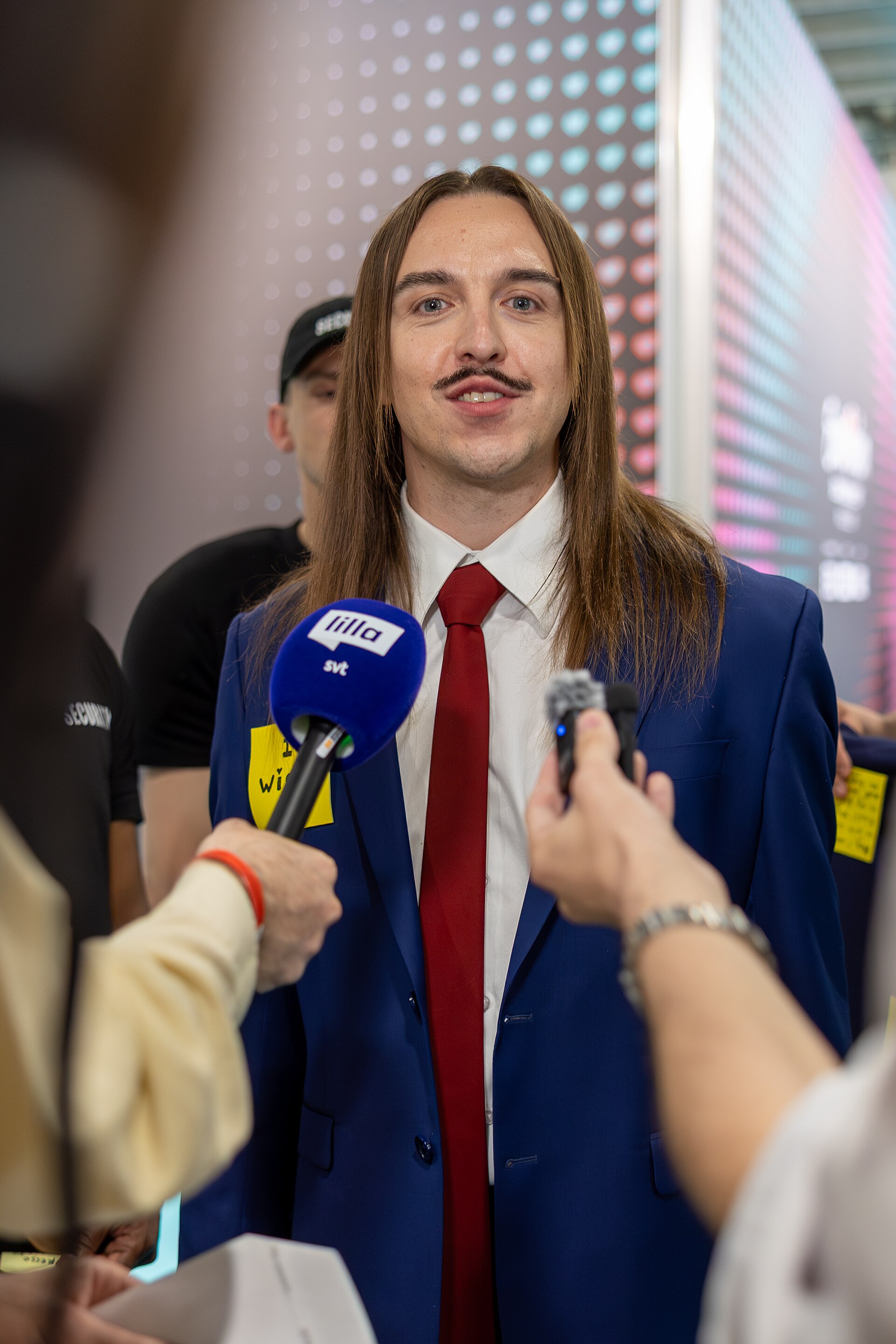 Tommy Cash, representing Estonia, being interviewed at Eurovision 2025 in Basel, Switzerland.