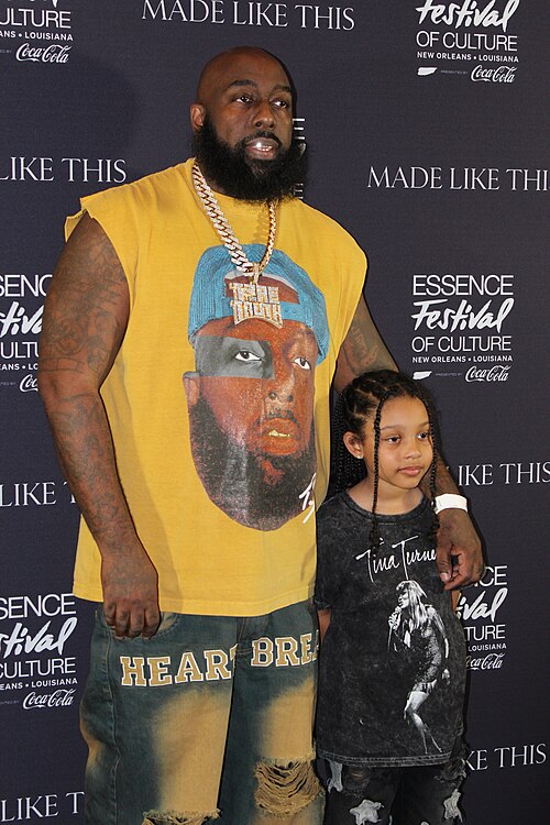 Trae Tha Truth with his beautiful daughter at the Essence Festival of Culture 2025 in New Orleans, Louisiana in July 2025.