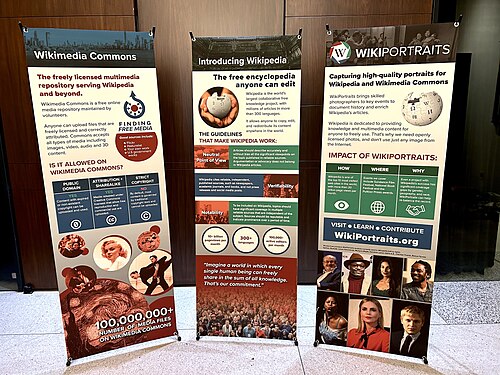 Wikipedia, WikiPortraits, and Wikimedia Commons printed banners on display for WikiPortraits at SXSW 2024.