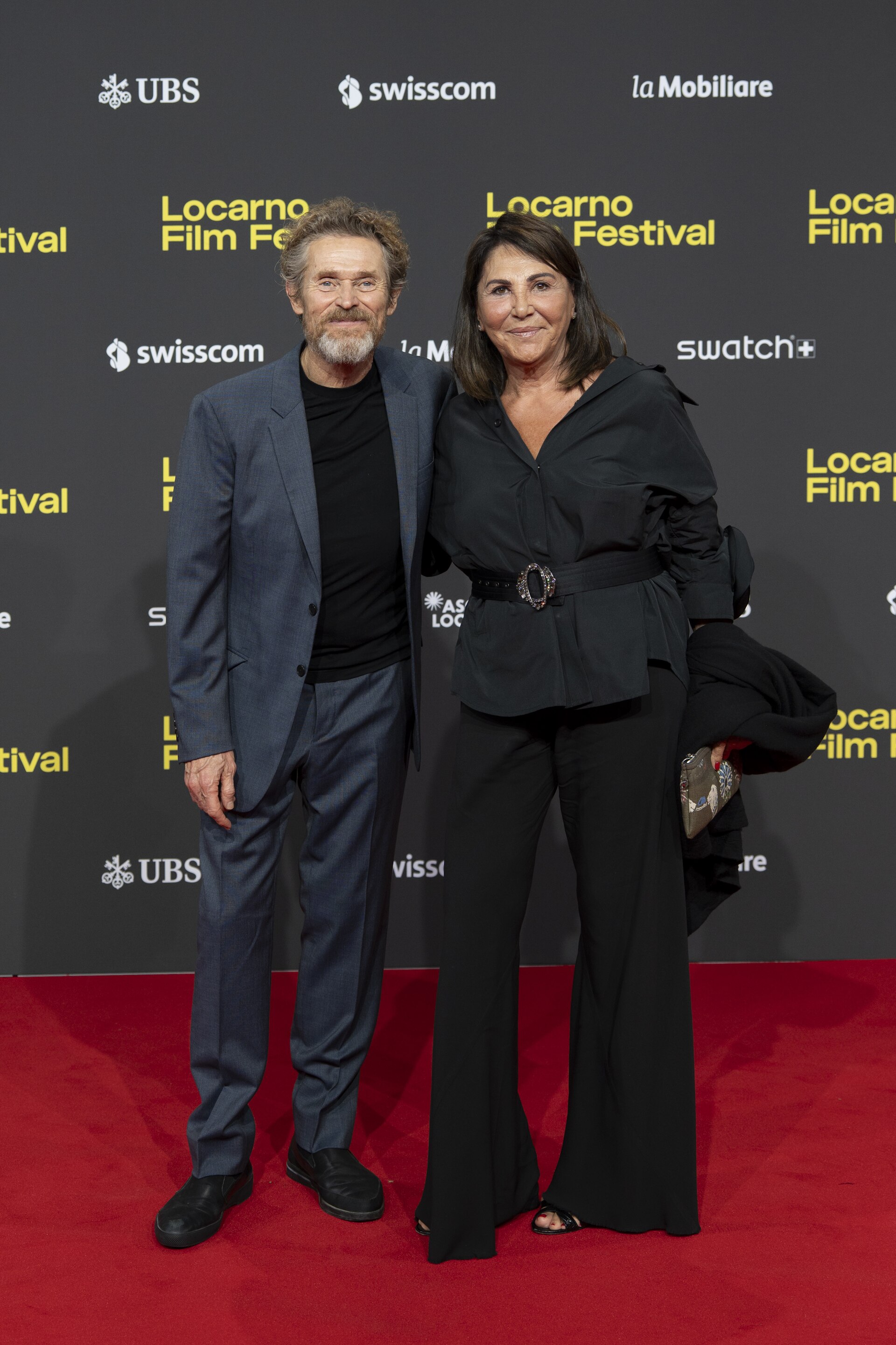 Actor Willem Dafoe and designer Beatrice Bulgari at 78th Locarno Film Festival red carpet