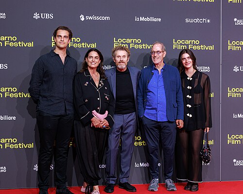 Willem Dafoe, Maja Hoffmann and guests attend the 'The Birthday Party' red carpet during the 78th Locarno Film Festival on August 07, 2025 in Locarno, Switzerland.