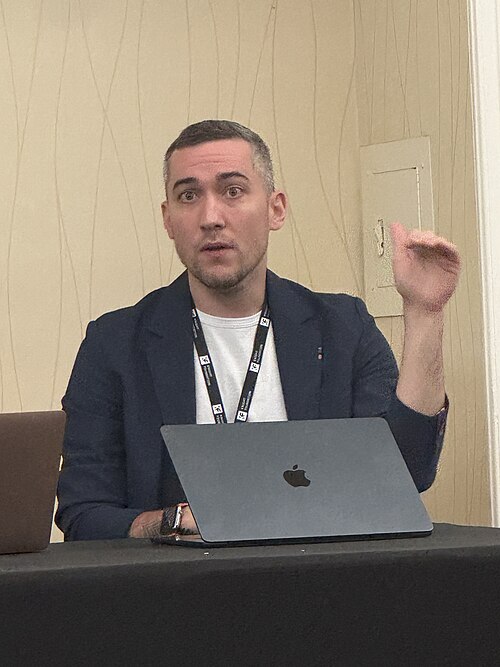 Yoel Roth, VP of Trust and Safety at Match Group, speaking at the 2025 Knight Media Forum in Miami, Florida in February 2025