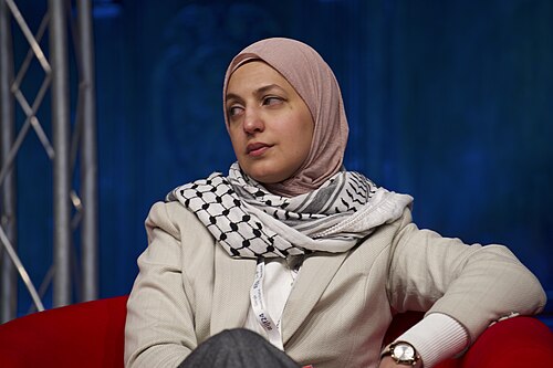 Youmna ElSayed, Gaza Strip correspondent for Al Jazeera English,  speaking at the International Journalism Festival 2024 in Perugia, Italy a part of a panel called “Covering Gaza, against all the odds”