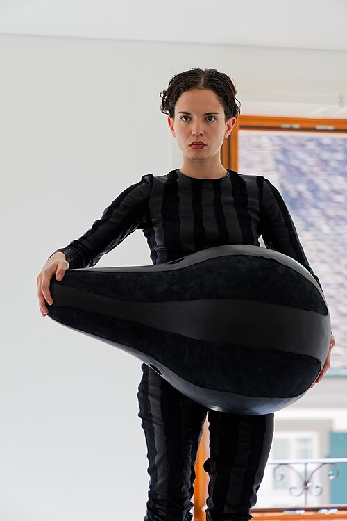 "The Squash" by Anthea Hamilton being performed at Basel Social Club 2025.