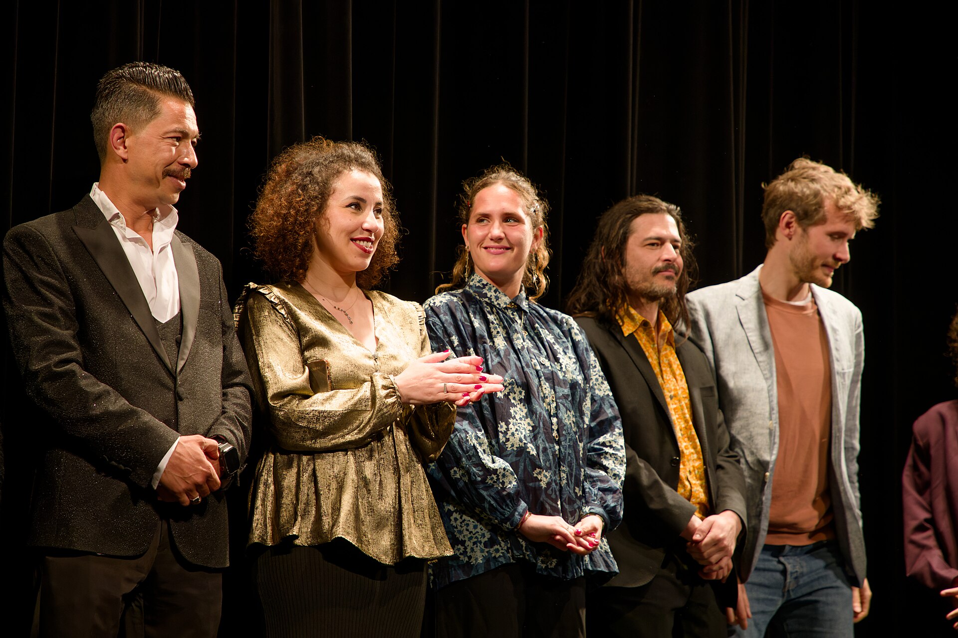 A few members of the cast and crew of Across the Sea at the 2024 Cannes Film Festival.