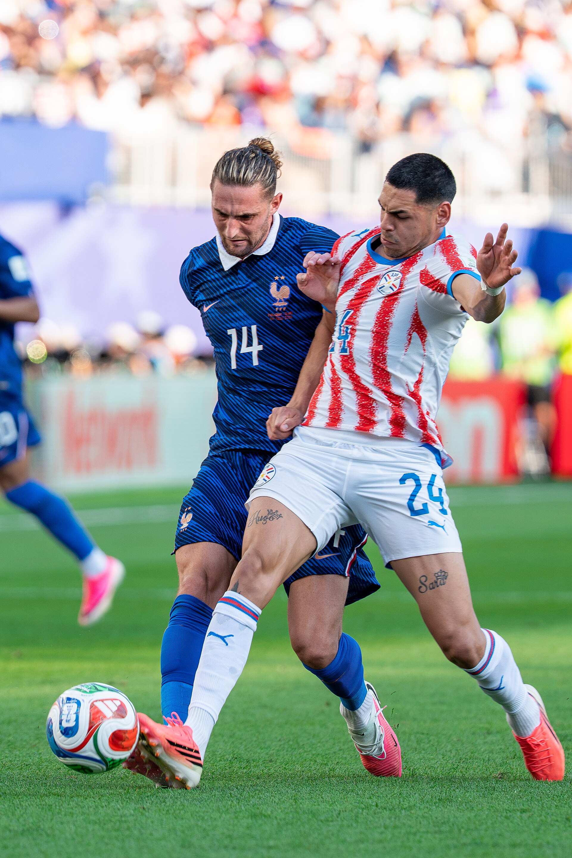 Adrien Rabiot Gustavo Caballero during France v Paraguay at the 2026 FIFA World Cup