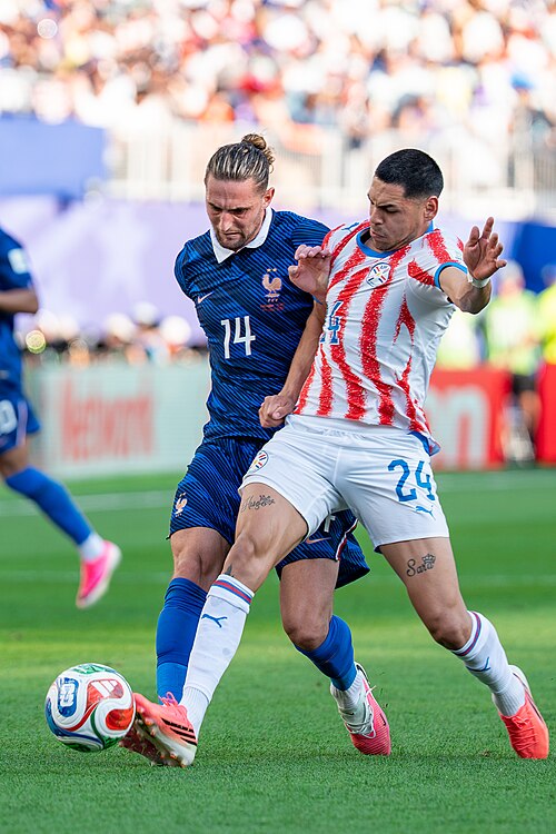 Adrien Rabiot Gustavo Caballero during France v Paraguay at the 2026 FIFA World Cup