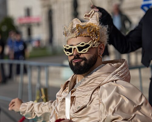 Akylas representing Greece on the Turquoise Carpet at the 2026 Eurovision Song Contest in Vienna