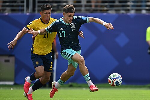 EAST RUTHERFORD, UNITED STATES - June 25: Alan Franco #21 of Ecuador battles for possession with Florian Wirtz #17 of Germany during the FIFA World Cup 2026 Group E match between Ecuador  and  Germany on June 25, 2026 MetLife Stadium, East Rutherford, New Jersey